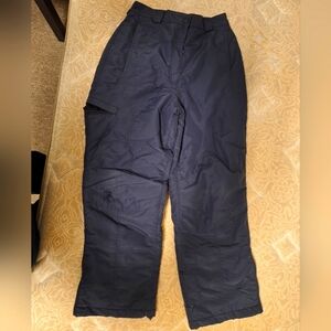 A pair of L.L. Bean kids' snow pants in a size 14. Pre-loved with some flaws.